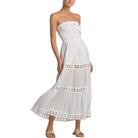 White strapless dress with lace details on a white background