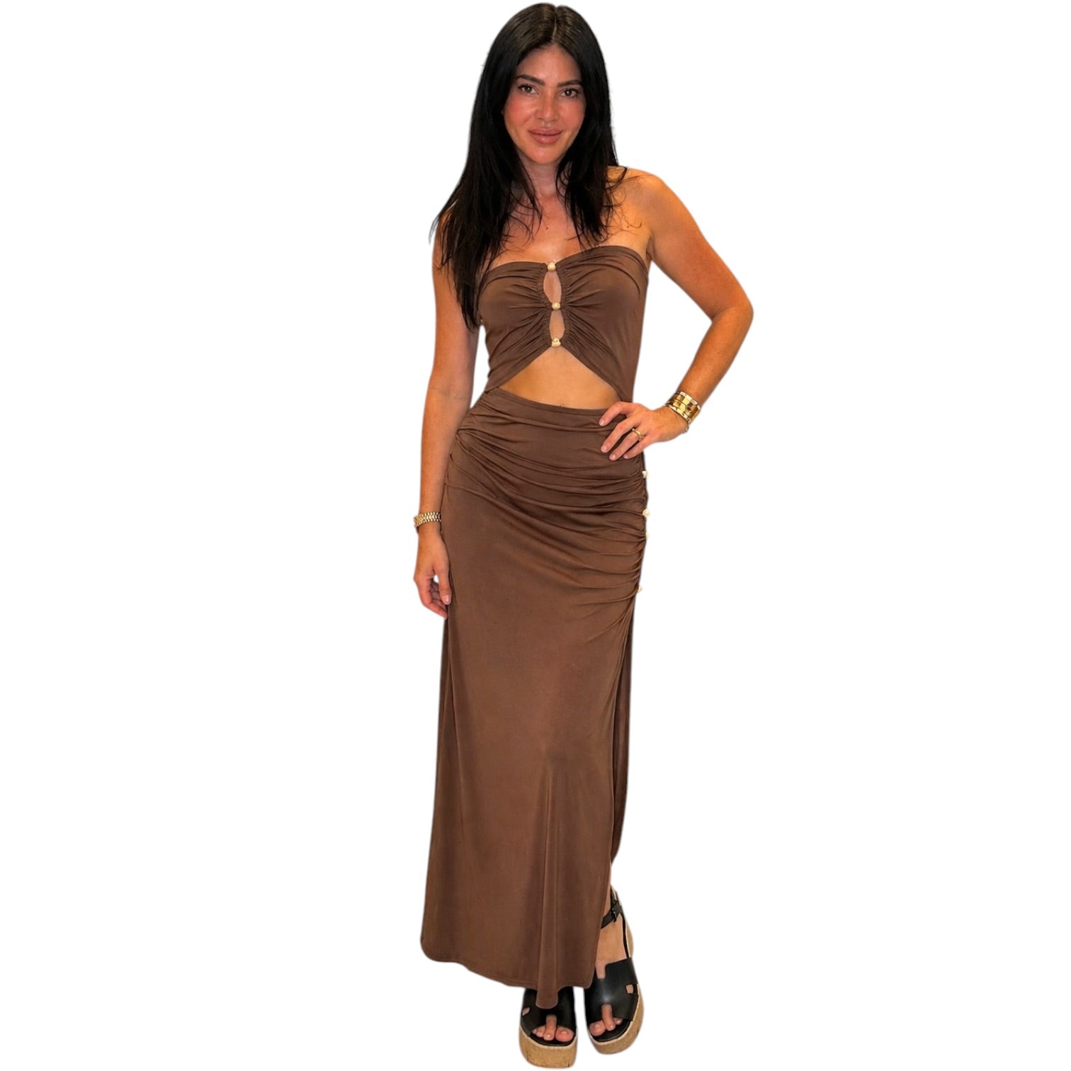 Woman wearing a brown dress on a white background