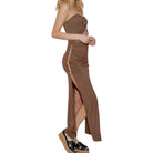 Brown strapless dress with a high slit on a white background