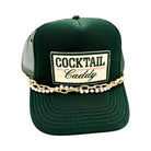 Green cap with 'Cocktail Caddy' patch and pearl chain on a white background