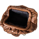 Cognac woven handbag on a white background