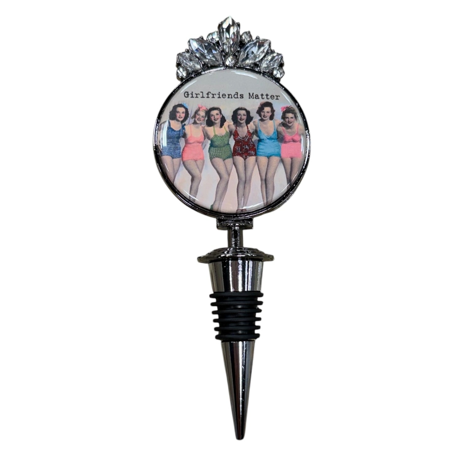 A novelty wine bottle stopper featuring a circular printed graphic of the band Girls Like Girls with the text 'Girlsfriends Matter' and a silver metallic top and pointed black-and-silver stopper base.