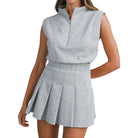 Gray sleeveless top and skirt set on a white background
