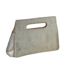 A structured handbag made from textured cowhide with a cutout handle, featuring light brown contrast stitching along the edges, shown on a plain white background.
