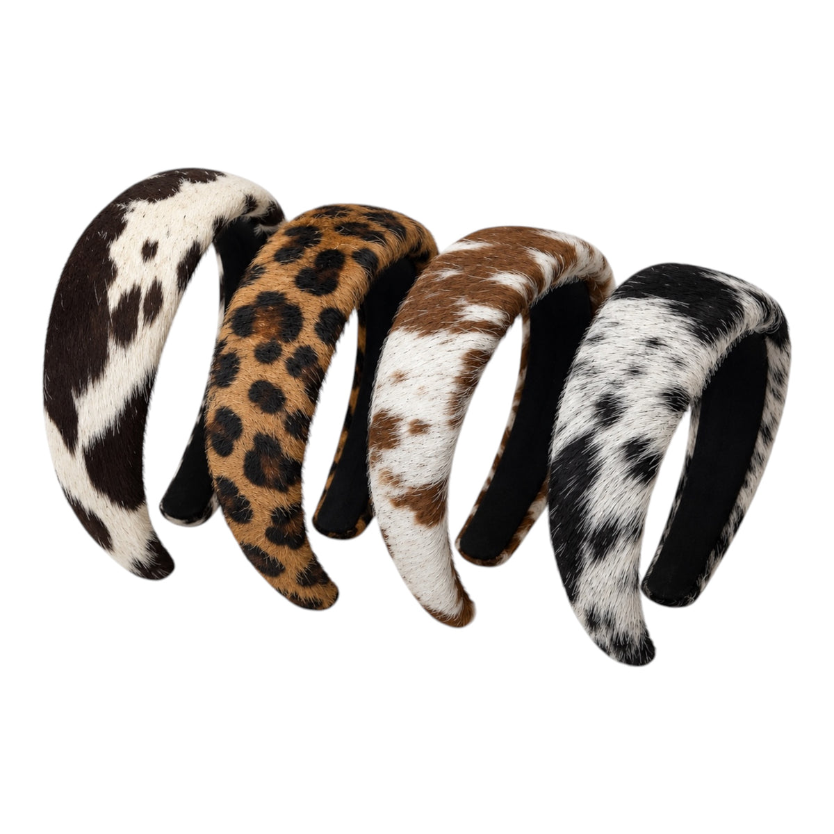 Four wide curved headbands with animal print patterns, including cowhide, leopard, and black-and-white spotted designs, arranged in a fan shape on a white background.