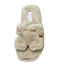 Beige fluffy slipper on a white background