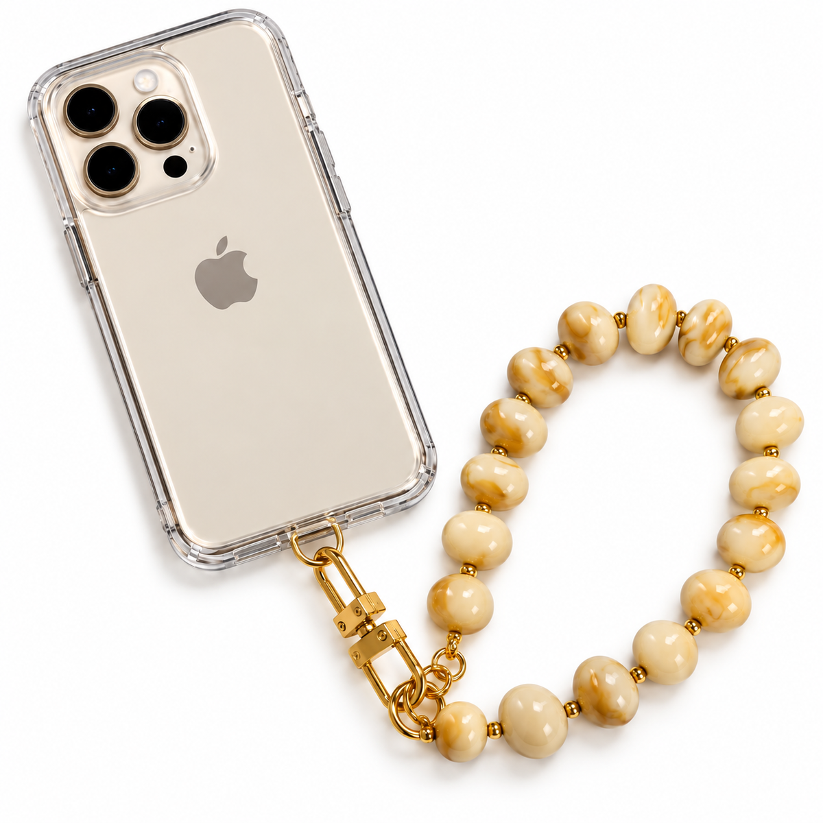 A clear iPhone case with a gold-tone clasp attached to a beaded wrist strap made of cream and tan marbled beads, shown on a white background.