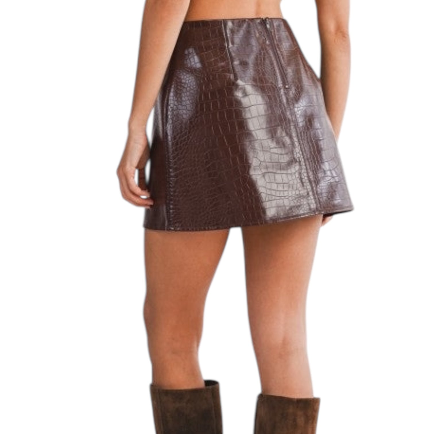 Brown crocodile-patterned skirt worn by a person on a white background