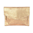 A metallic gold clutch bag with a textured python-style embossed pattern, shown against a plain white background.