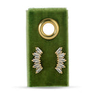 Gold and clear baguette stud earrings on a green earring card with a gold ring.