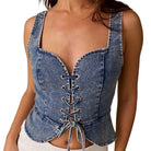 woman wearing denim lace-up corset top on white background