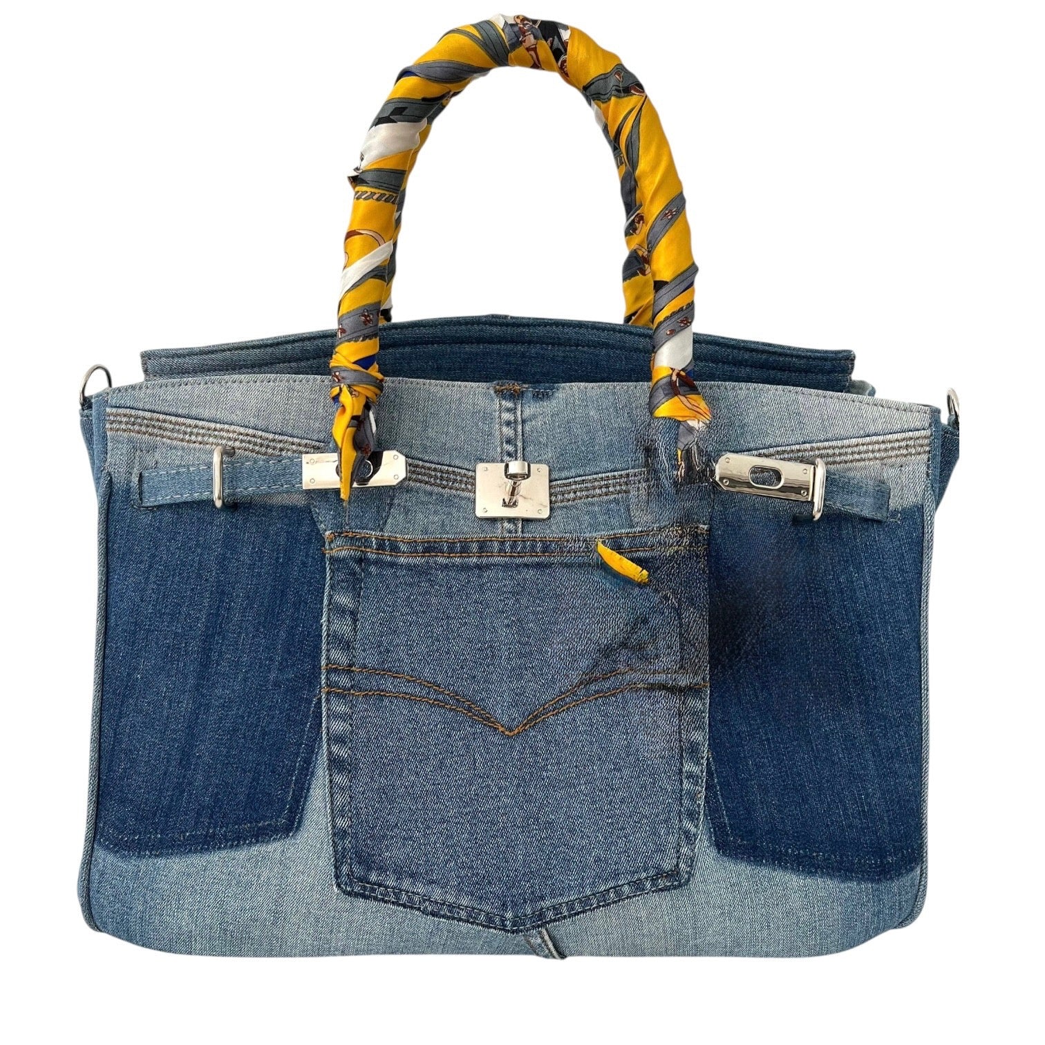 Denim handbag with a colorful handle on a white background