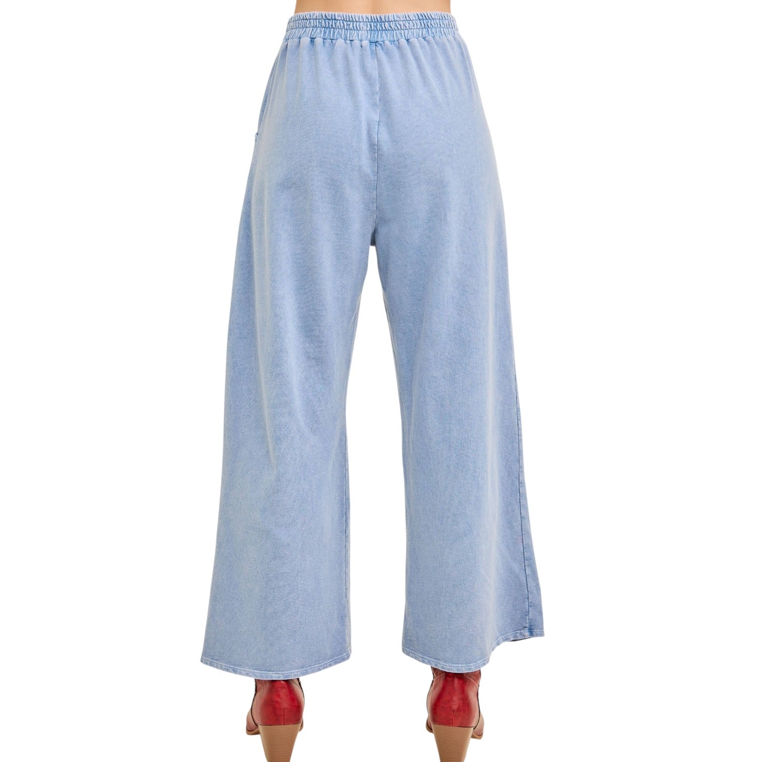 Light blue wide-leg pants on a white background