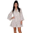 Woman wearing a floral dress on a white background