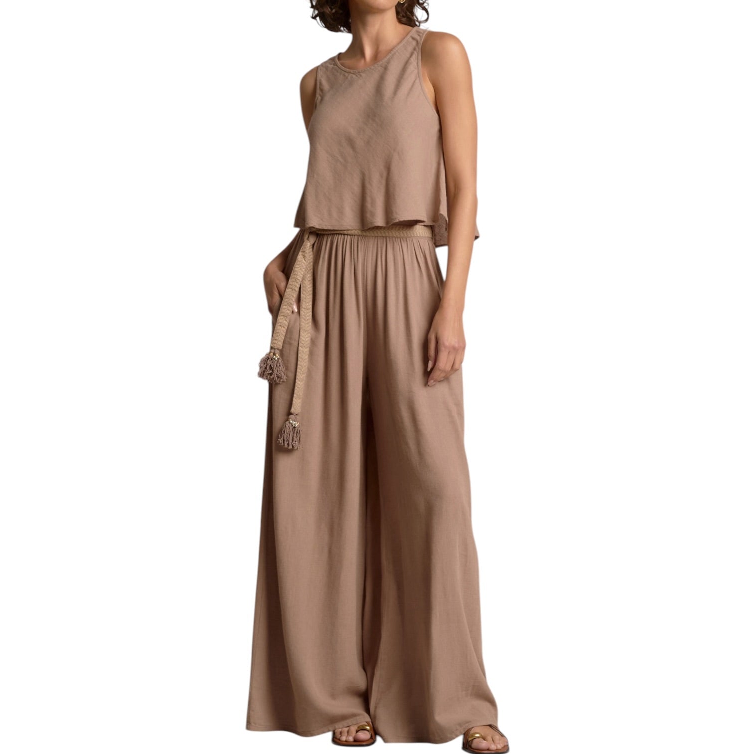 Brown jumpsuit with a belt on a white background