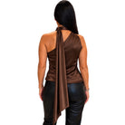 A woman viewed from the back wearing a brown satin halter-style top with a draped tie detail and black pants, against a plain white background.