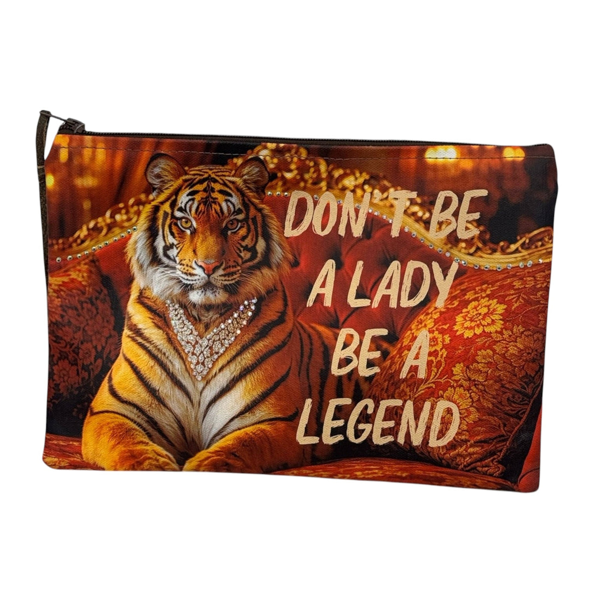 A rectangular zip pouch featuring a printed design of a majestic tiger wearing a pearl necklace, set against a luxurious red and gold patterned background. The text 'DON'T BE A LADY BE A LEGEND' is printed in a bold, light-colored font across the center.