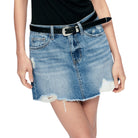 Denim skirt with a black belt on a white background