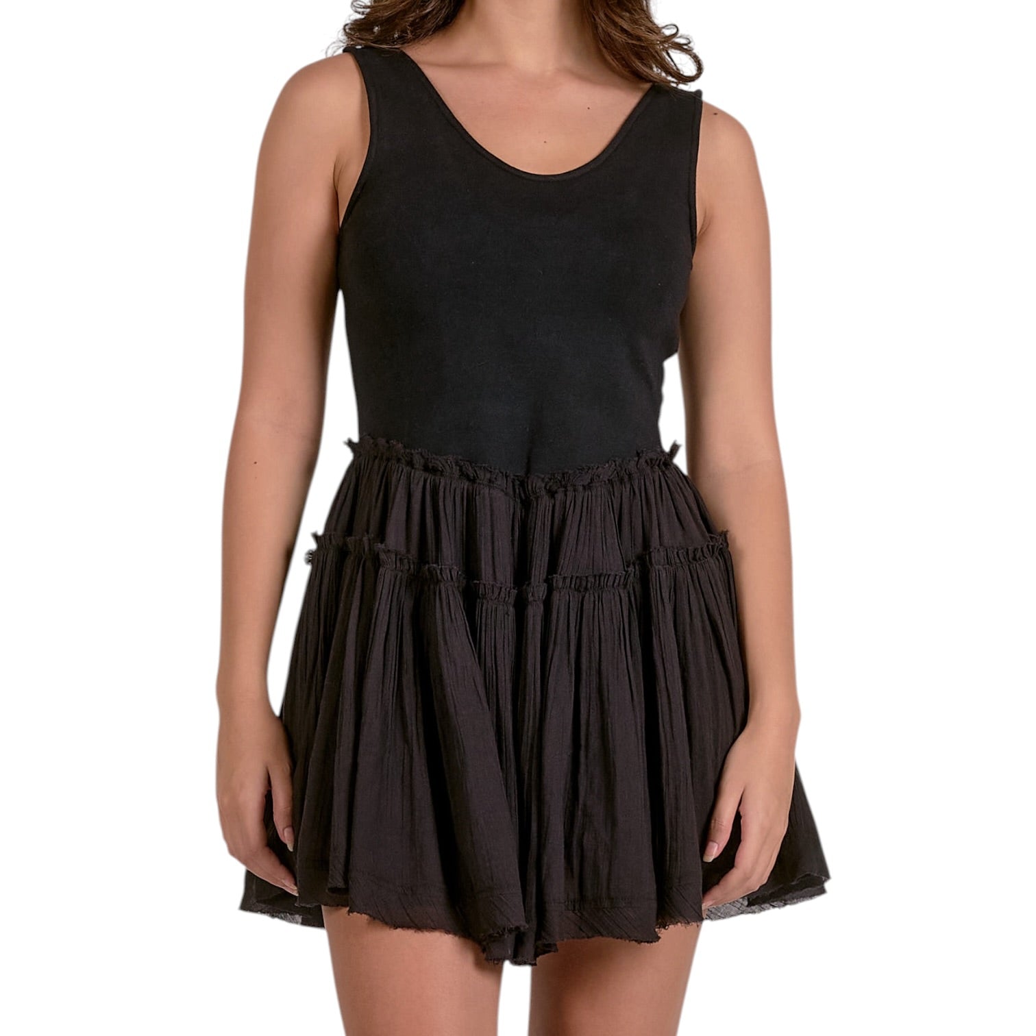 Black sleeveless dress worn by a model on a white background