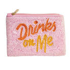 Pink beaded pouch with 'Drinks on Me' text in orange and yellow on a white background
