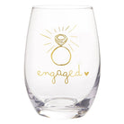 Clear glass with gold 'engaged' design on a white background