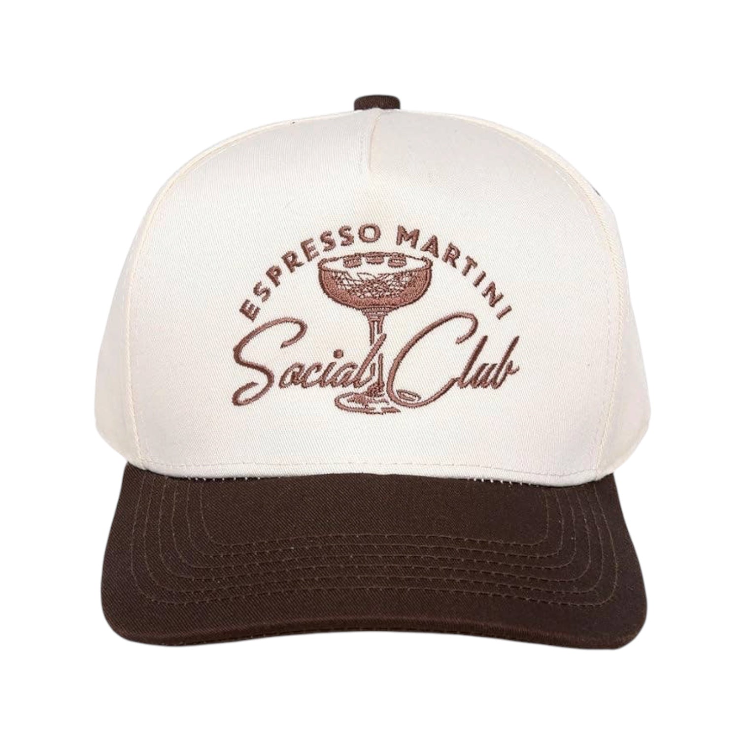 A structured trucker-style cap with an off-white crown and a dark brown brim. The front features an embroidered design with the words 'ESPRESSO MARTINI Social Club' in brown around an illustration of an espresso martini glass.