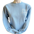 Light blue sweatshirt with 'Family Over Everything' text on a white background