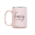 Pink mug with black text on a white background