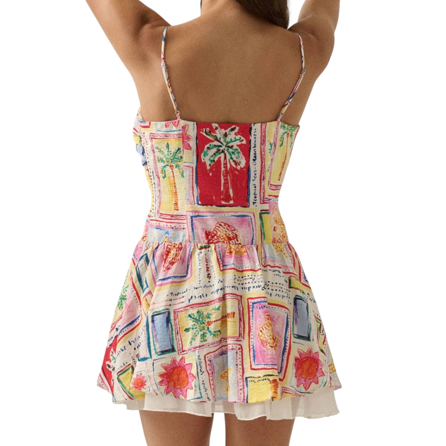 Colorful patterned dress with palm tree design on a white background