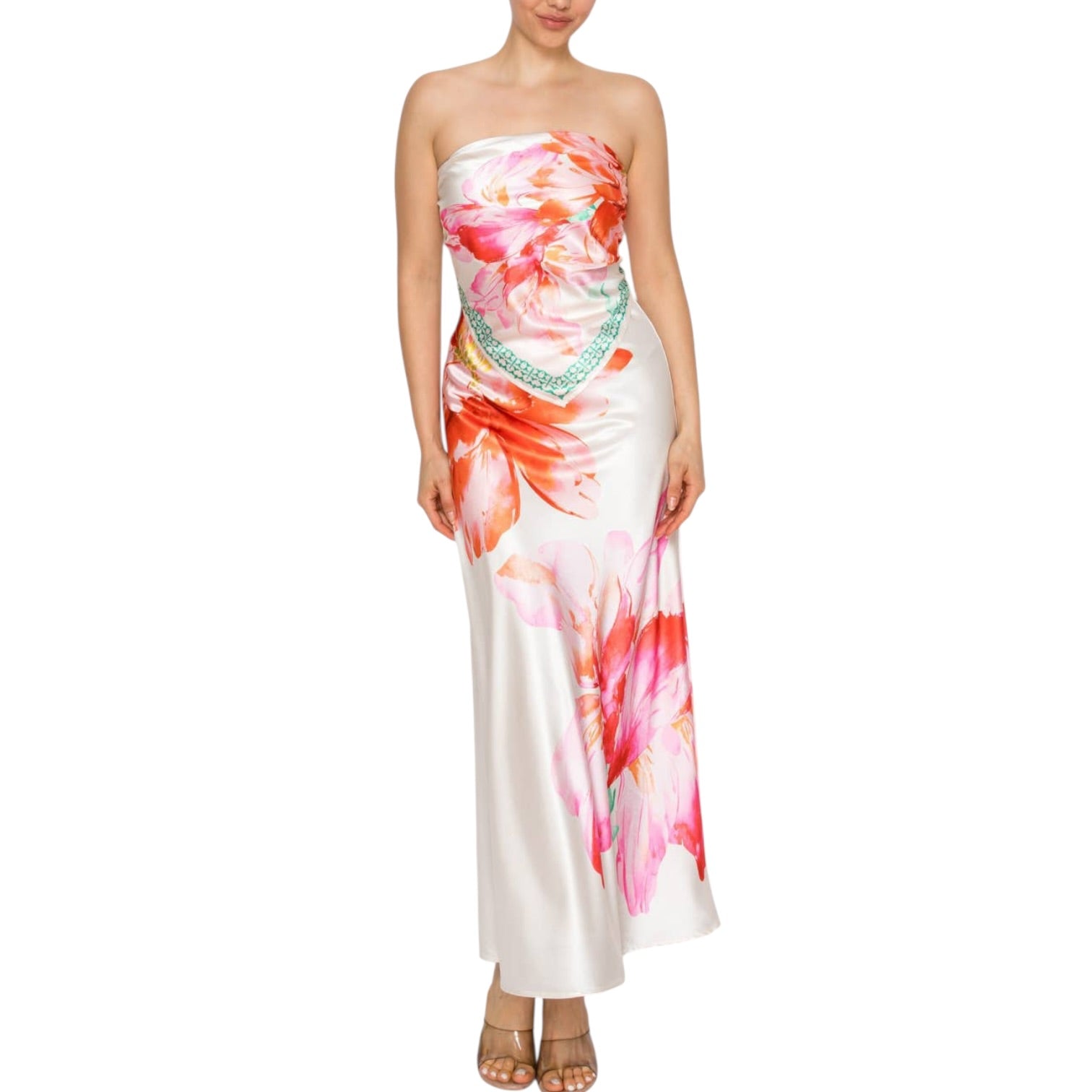 Woman wearing a strapless floral set on a white background