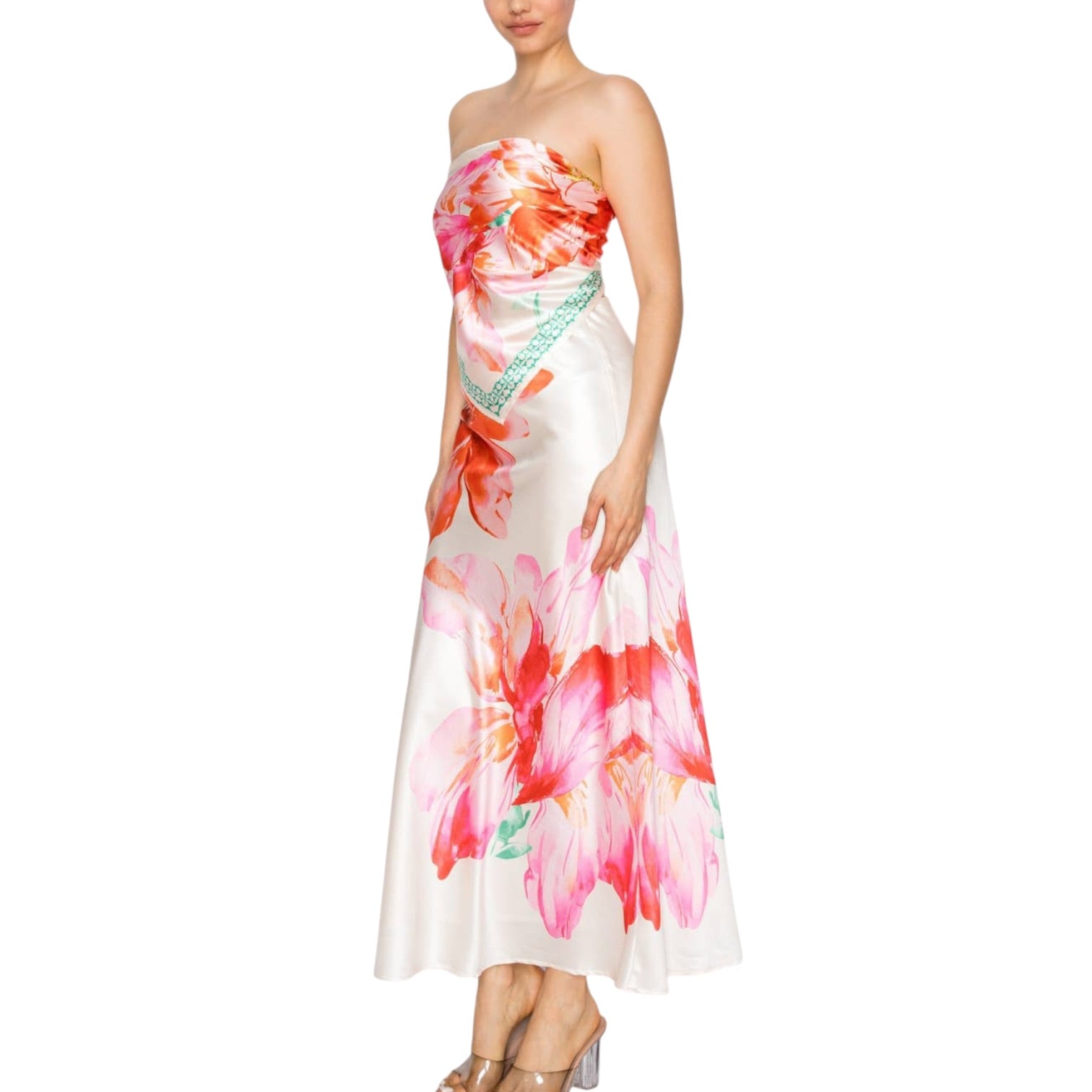 Woman wearing a strapless floral set on a white background