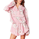 Pink floral lounge set with a white background