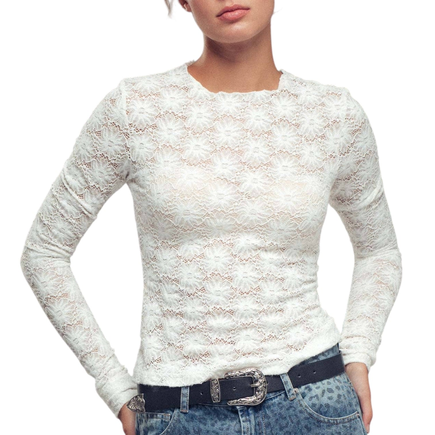 White lace long-sleeve top worn by a person on a white background