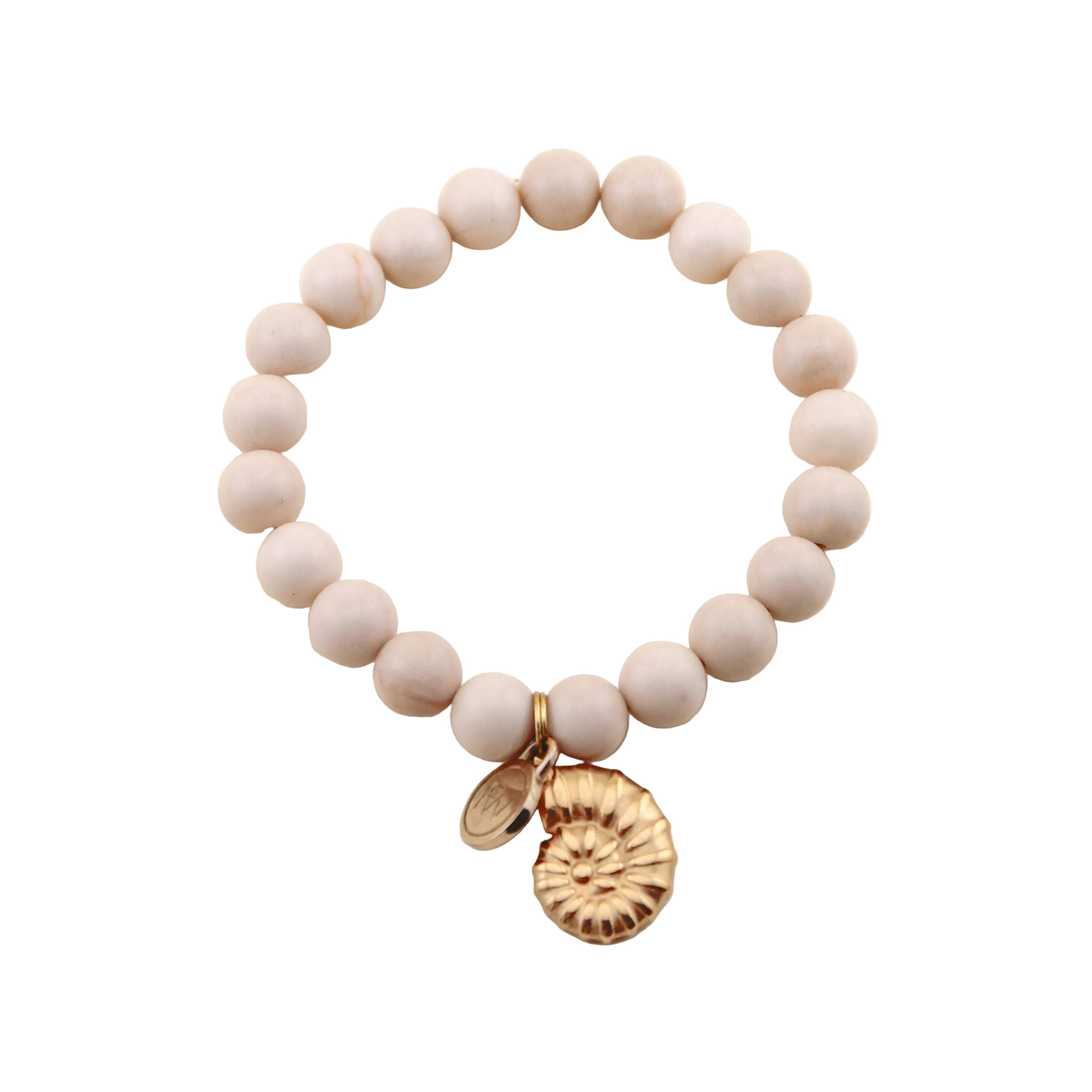 Beige beaded bracelet with a gold charm on a white background