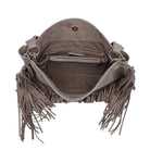 A taupe faux-suede shoulder bag with long fringe detailing, shown from an overhead view to display its interior compartments, zippered pocket, and hardware.
