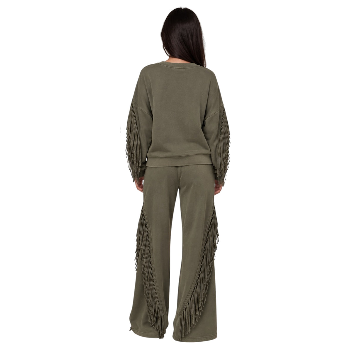 A woman viewed from the back wearing an olive green matching lounge set with long fringe detailing on the sleeves and pants, set against a plain white background.