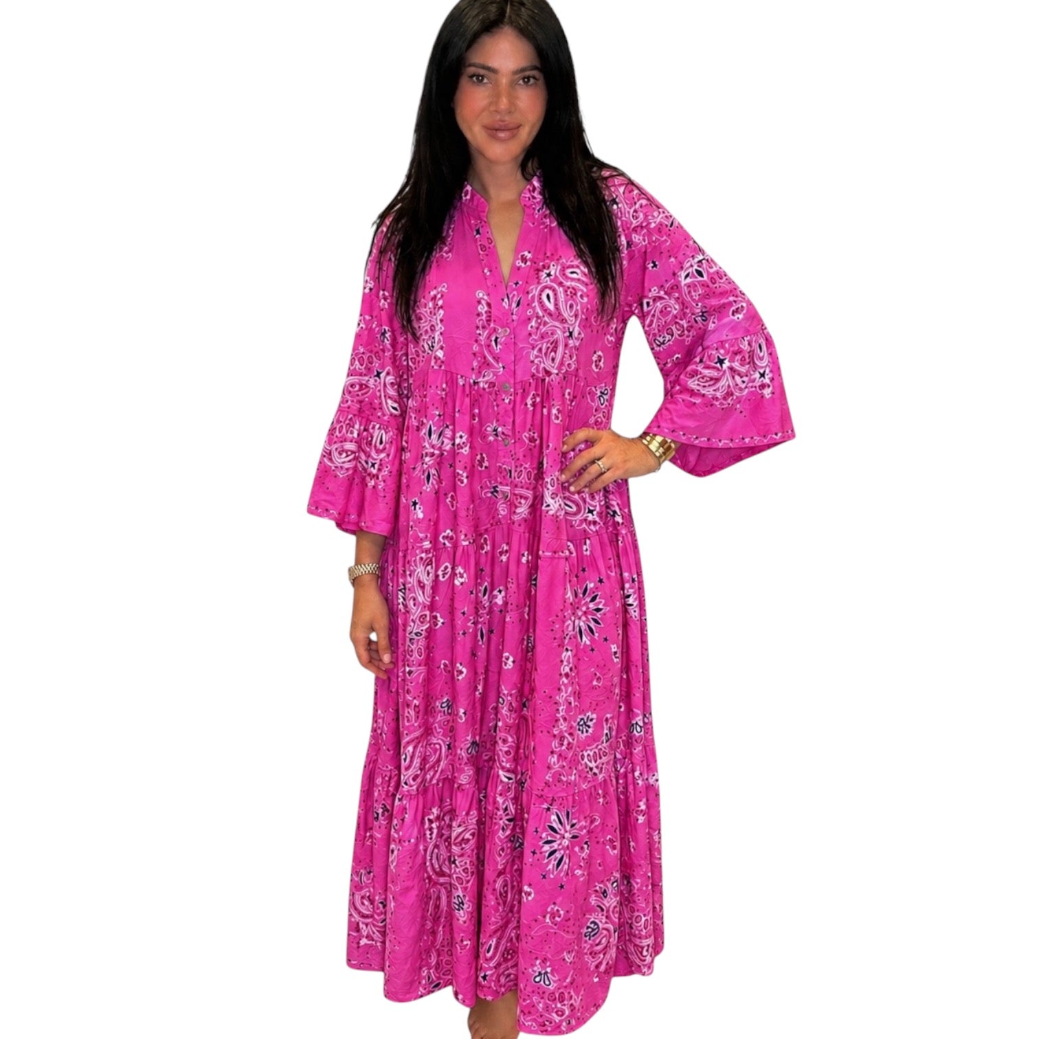 Woman wearing a pink floral dress on a white background