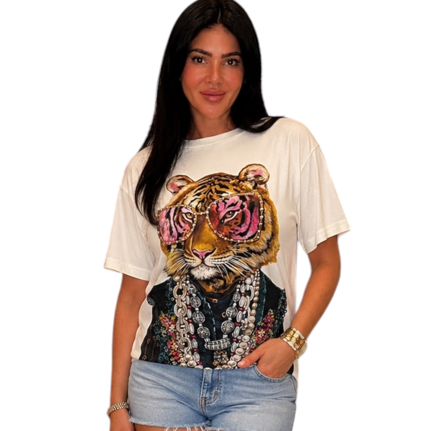 Woman wearing a white t-shirt with a tiger graphic design on a plain background