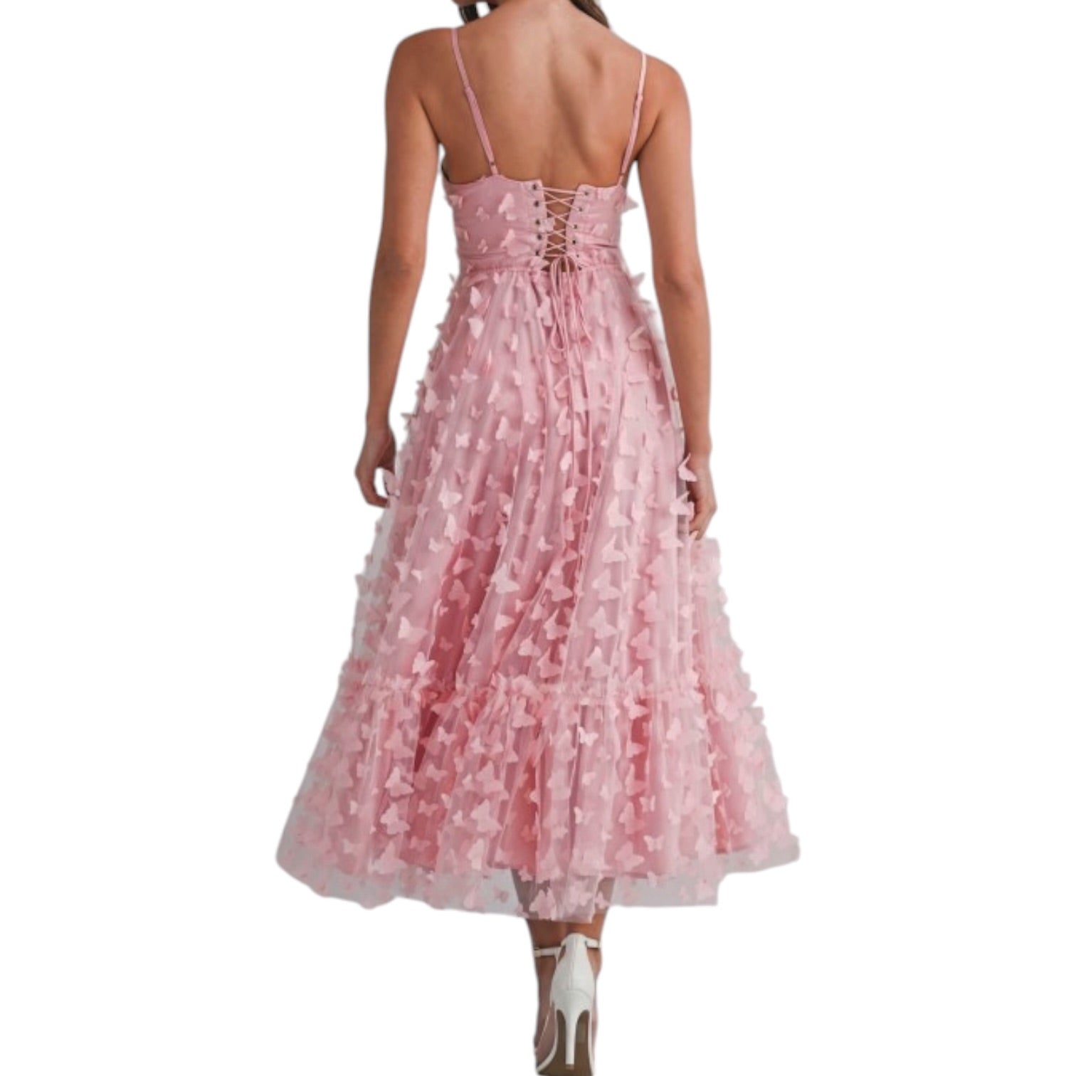 a woman wearing pink dress with butterflies on white background