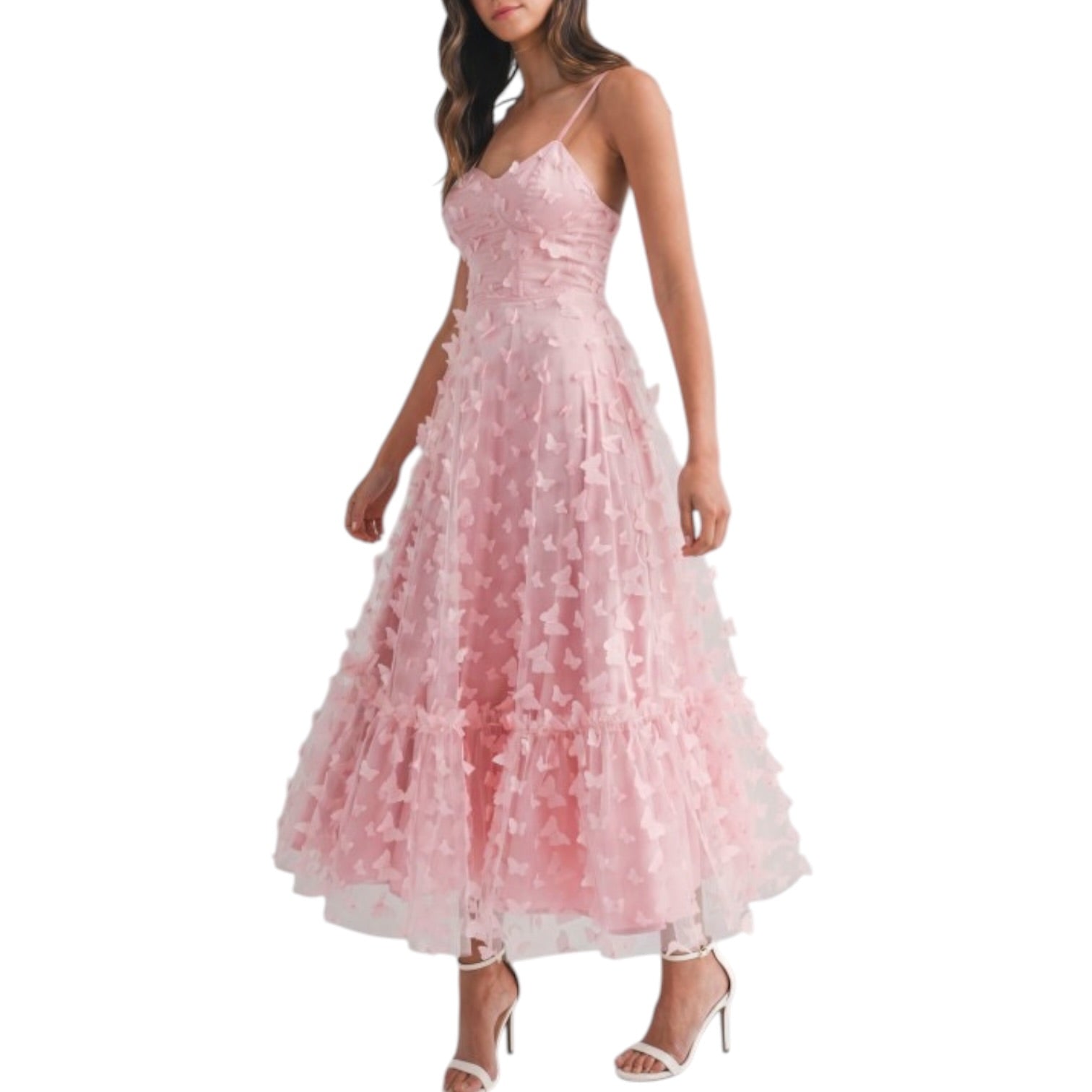a woman wearing pink dress with butterflies on white background