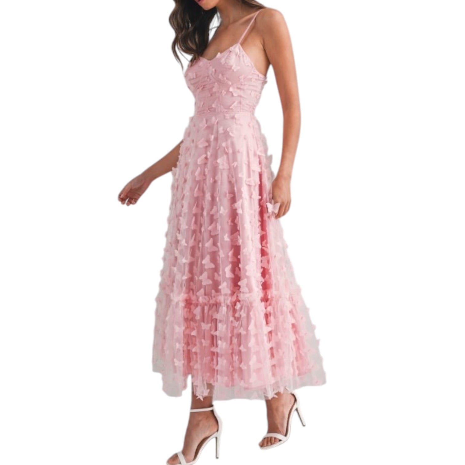 a woman wearing pink dress with butterflies on white background
