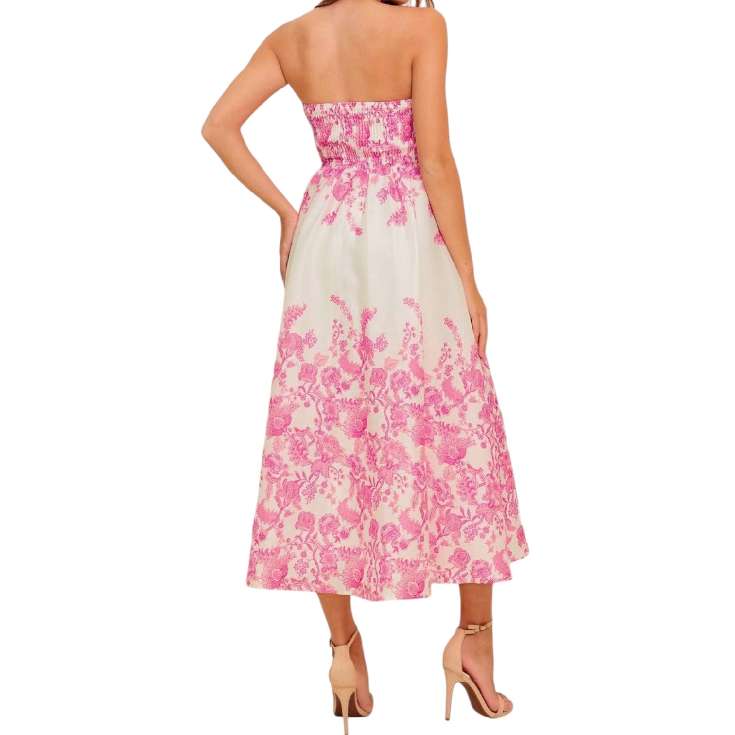 a woman wearing an ivory pink floral dress with pocket on white background.