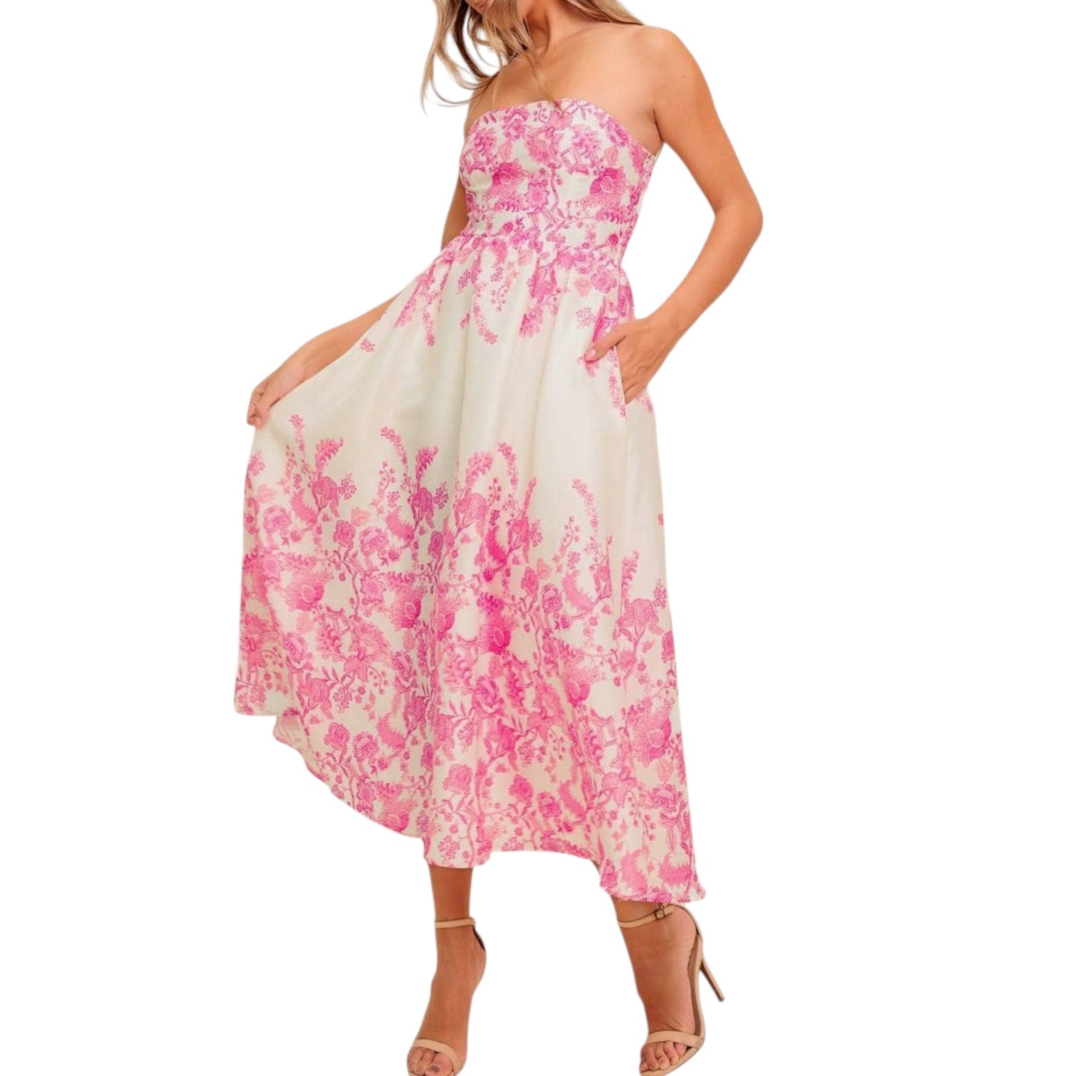 a woman wearing an ivory pink floral dress with pocket on white background.