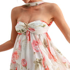 Woman wearing a floral dress on a white background