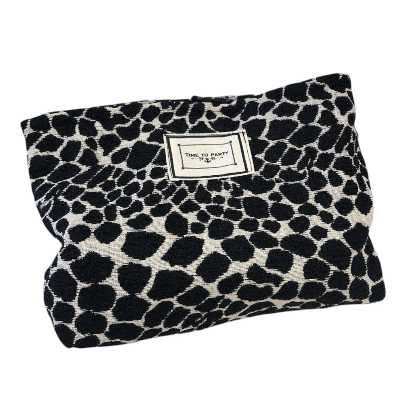A black and off-white spotted animal print pouch with a white brand label reading 'TIME TO PARTY' on a plain white background.