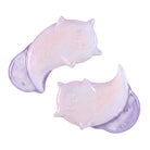 Two crescent moon-shaped gel patches with a pastel pink and lavender iridescent finish, shown on a plain white background.