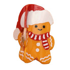 A gingerbread man-shaped novelty item, likely a pocket knife or small tool, decorated with a red Santa hat, red and white striped scarf, and white icing-like details on an orange-brown body, isolated on a white background.