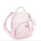Pink quilted backpack with a bow and pearl handle on a white background
