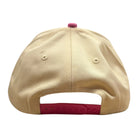 Beige cap with a pink brim on a white background