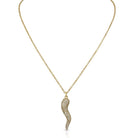 Gold necklace with a unique pendant on a white background